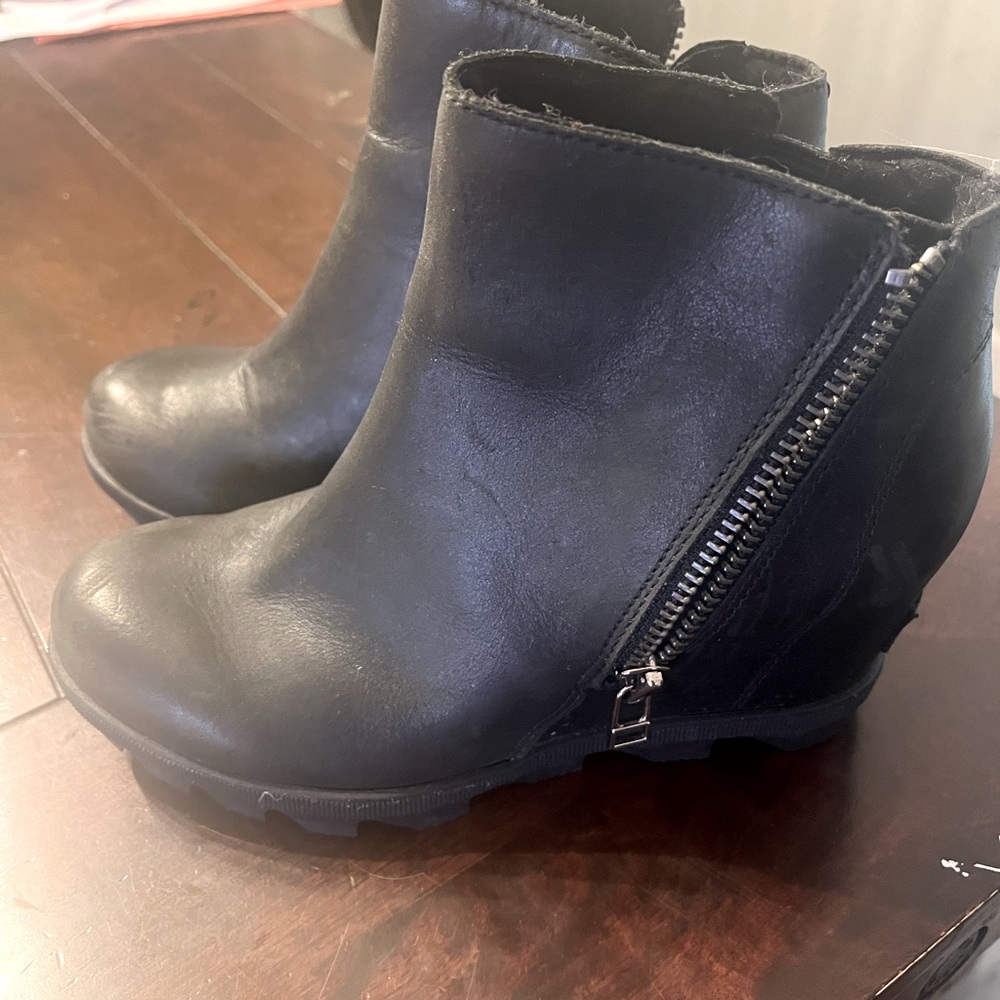 Sorel black booties. Like new. Waterproof, leather, with a wedge.